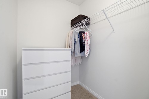 The property features a closet with a wire shelving system, offering storage solutions - 2553 Coughlan Road, Edmonton, AB - Indoor With Storage