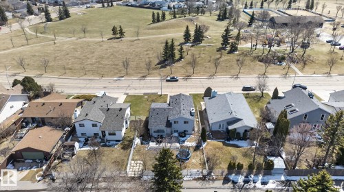 Detached residence with a gray shingled roof and light-colored siding - 18604 97A Avenue, Edmonton, AB - Outdoor With View