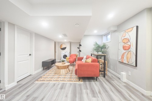 Finished lower level featuring recessed lighting, light wood-finish flooring, and light gray wall tones - 4203 83 Street, Edmonton, AB - Indoor