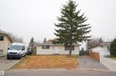 Single-story residence featuring light-colored siding and a dark shingled roof - 4203 83 Street, Edmonton, AB  - Outdoor 