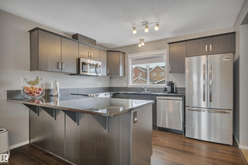 419 Simpkins Link, Leduc, AB - Indoor Photo Showing Kitchen With Stainless Steel Kitchen