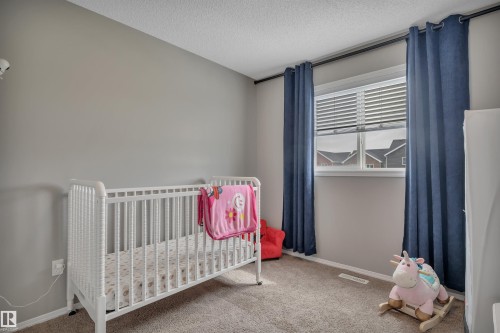 419 Simpkins Link, Leduc, AB - Indoor Photo Showing Bedroom