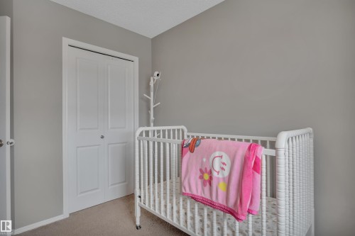 419 Simpkins Link, Leduc, AB - Indoor Photo Showing Bedroom