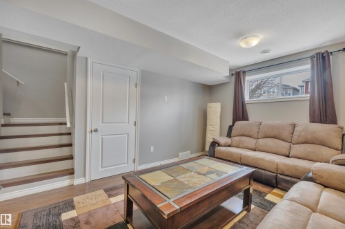 419 Simpkins Link, Leduc, AB - Indoor Photo Showing Living Room