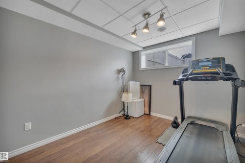 419 Simpkins Link, Leduc, AB - Indoor Photo Showing Gym Room