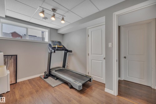 419 Simpkins Link, Leduc, AB - Indoor Photo Showing Gym Room