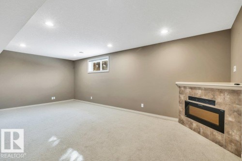 17 12610 15 Avenue, Edmonton, AB - Indoor With Fireplace