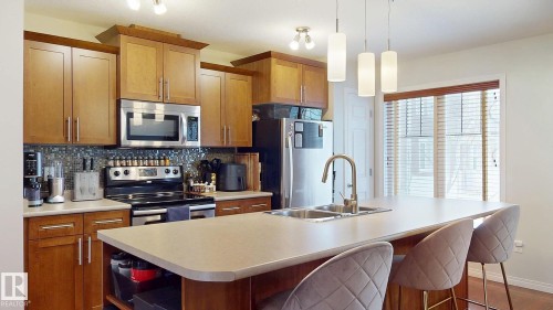 4942 Terwillegar Common, Edmonton, AB - Indoor Photo Showing Kitchen With Stainless Steel Kitchen With Double Sink