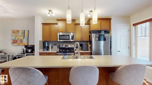 4942 Terwillegar Common, Edmonton, AB - Indoor Photo Showing Kitchen With Stainless Steel Kitchen With Double Sink