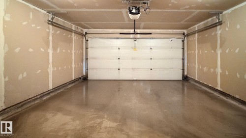 4942 Terwillegar Common, Edmonton, AB - Indoor Photo Showing Garage