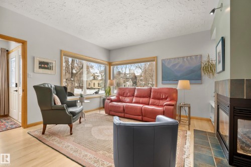 9604 100A Street, Edmonton, AB - Indoor Photo Showing Living Room With Fireplace