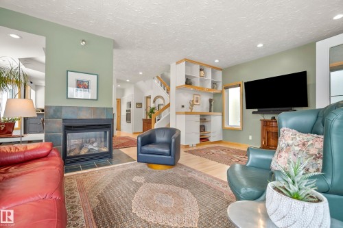 9604 100A Street, Edmonton, AB - Indoor Photo Showing Living Room With Fireplace