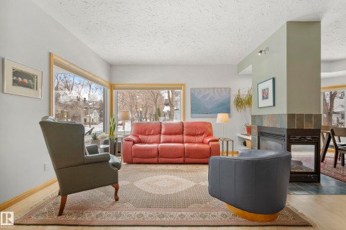 9604 100A Street, Edmonton, AB - Indoor Photo Showing Living Room With Fireplace