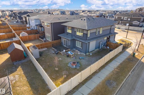 Modern two-story residence featuring a gray and dark gray exterior with multiple windows - 2 Edison Drive, St. Albert, AB - Outdoor