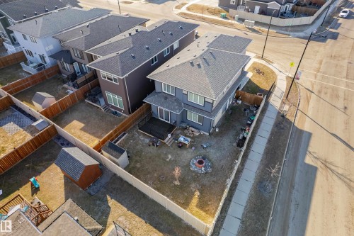 Two-story residential property featuring a gray exterior and dark gray roof - 2 Edison Drive, St. Albert, AB - 