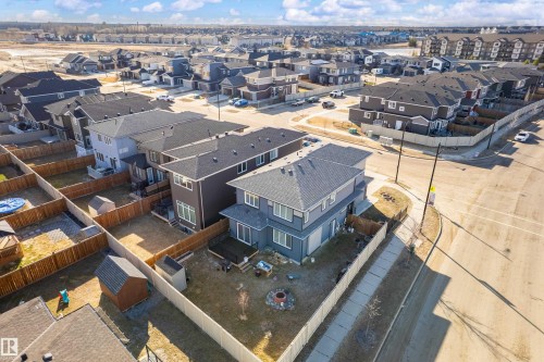 Modern two-story residence featuring a light grey exterior with dark grey trim - 2 Edison Drive, St. Albert, AB - Outdoor With View
