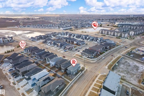 Aerial overview of a developed residential community featuring detached homes and multi-family residences - 2 Edison Drive, St. Albert, AB - Outdoor With View
