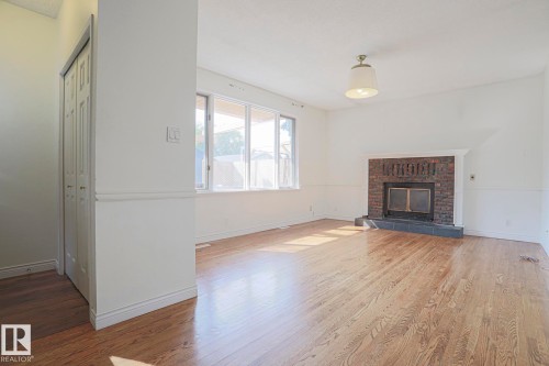 14019 106 Avenue, Edmonton, AB - Indoor Photo Showing Living Room With Fireplace