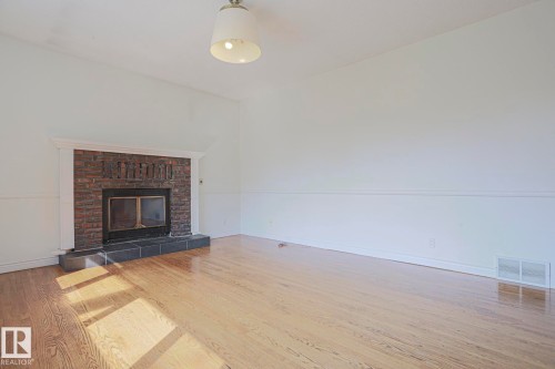14019 106 Avenue, Edmonton, AB - Indoor Photo Showing Living Room With Fireplace
