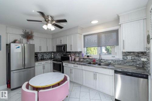 3511 33 Avenue, Edmonton, AB - Indoor Photo Showing Kitchen With Double Sink