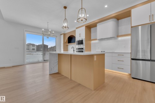 8790 Mayday Lane, Edmonton, AB - Indoor Photo Showing Kitchen With Upgraded Kitchen