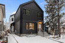 Modern black facade with vertical and horizontal siding - 11418 96 Street, Edmonton, AB  - Outdoor With Facade 