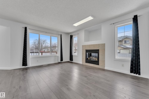 208 79 Street, Edmonton, AB - Indoor Photo Showing Living Room With Fireplace