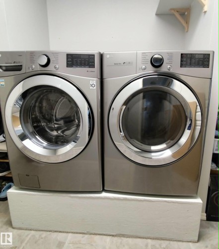 Image quality insufficient for description - 59 Rue Monette, Beaumont, AB - Indoor Photo Showing Laundry Room