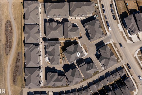 Aerial perspective showcasing a residential development with a marked property - 51 603 Orchards Boulevard Sw, Edmonton, AB - 