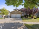 Traditional home with driveway, an attached garage, brick siding, and a front yard - 29 Oakdale Place, St. Albert, AB  - Outdoor With Facade 
