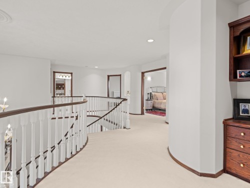 Corridor with an upstairs landing, carpet floors, recessed lighting, and arched walkways - 29 Oakdale Place, St. Albert, AB - Indoor Photo Showing Other Room