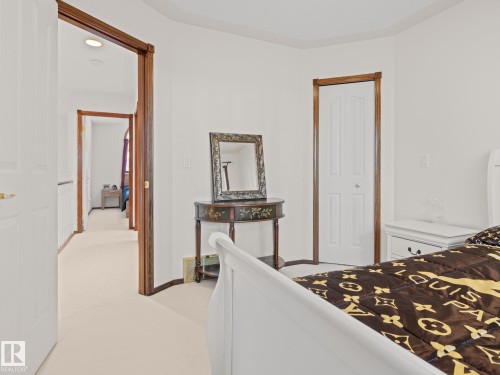 Bedroom with light colored carpet, a closet, and recessed lighting - 29 Oakdale Place, St. Albert, AB - Indoor Photo Showing Bedroom