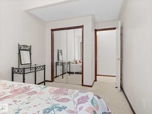 Bedroom with a closet and light colored carpet - 29 Oakdale Place, St. Albert, AB - Indoor Photo Showing Bedroom