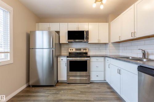 15 Walden Park, St. Albert, AB - Indoor Photo Showing Kitchen With Stainless Steel Kitchen With Double Sink