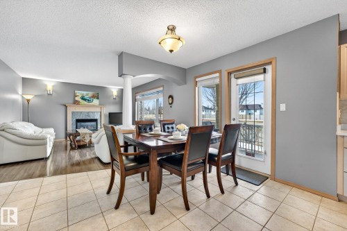 1354 118A Street, Edmonton, AB - Indoor Photo Showing Dining Room With Fireplace