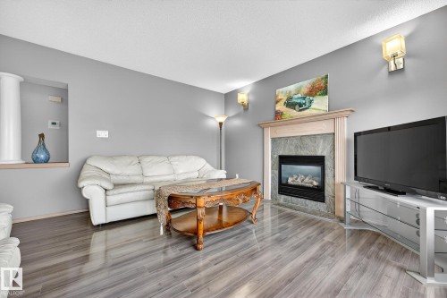 1354 118A Street, Edmonton, AB - Indoor Photo Showing Living Room With Fireplace