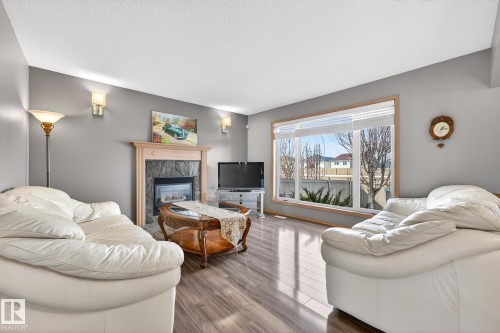 1354 118A Street, Edmonton, AB - Indoor Photo Showing Living Room With Fireplace