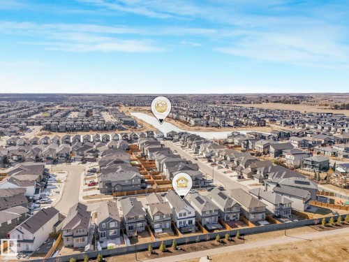 Aerial perspective showcasing a residential neighborhood with numerous detached homes - 4851 Kinney Road, Edmonton, AB - Outdoor With View