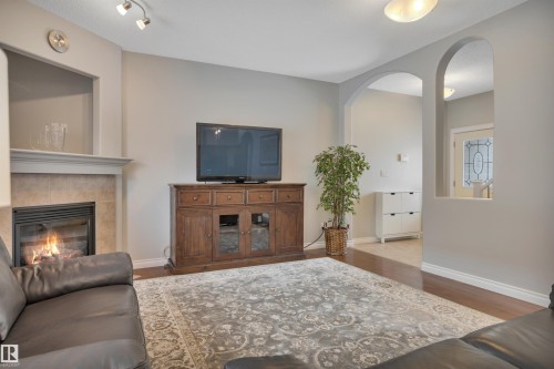 123 89 Rue Monette, Beaumont, AB - Indoor Photo Showing Living Room With Fireplace