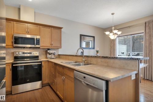 123 89 Rue Monette, Beaumont, AB - Indoor Photo Showing Kitchen With Double Sink
