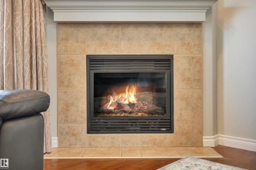 123 89 Rue Monette, Beaumont, AB - Indoor Photo Showing Living Room With Fireplace