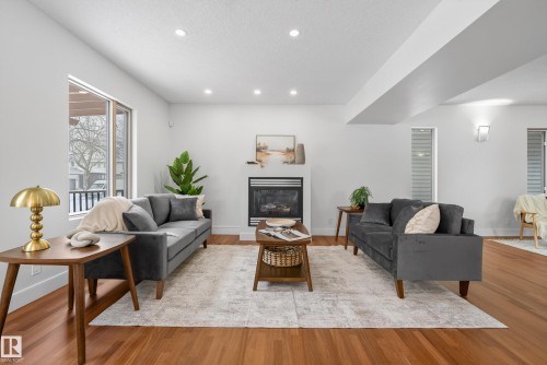 8860 93 Street, Edmonton, AB - Indoor Photo Showing Living Room With Fireplace