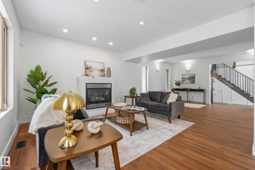 8860 93 Street, Edmonton, AB - Indoor Photo Showing Living Room With Fireplace