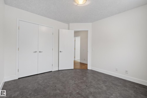 One of 3 bedrooms in the "east wing" of the house. - 8860 93 Street, Edmonton, AB - Indoor Photo Showing Other Room