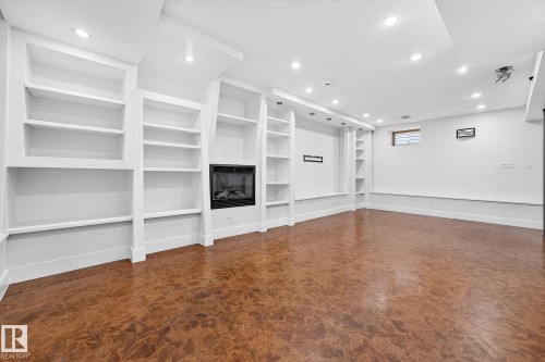 Fireplace and cork flooring make this an ideal theatre room! - 8860 93 Street, Edmonton, AB - Indoor