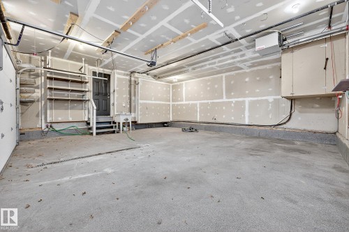 Oversized double/heated garage. Very rare find in this price range. - 8860 93 Street, Edmonton, AB - Indoor Photo Showing Garage