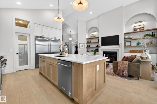 14 Jane Point(E), St. Albert, AB - Indoor Photo Showing Kitchen With Fireplace With Upgraded Kitchen