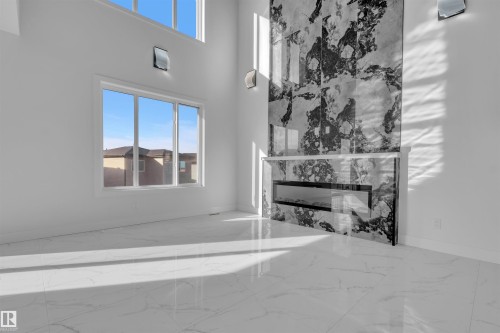 415 Pine Point(E), Leduc, AB - Indoor With Fireplace