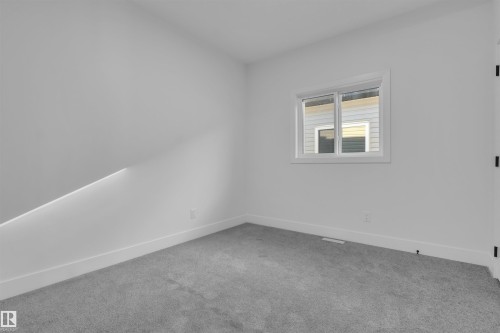 415 Pine Point(E), Leduc, AB - Indoor Photo Showing Other Room