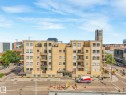 View of apartment building / complex with uncovered parking - 310 10606 102 Avenue, Edmonton, AB  - Outdoor With Balcony With Facade 